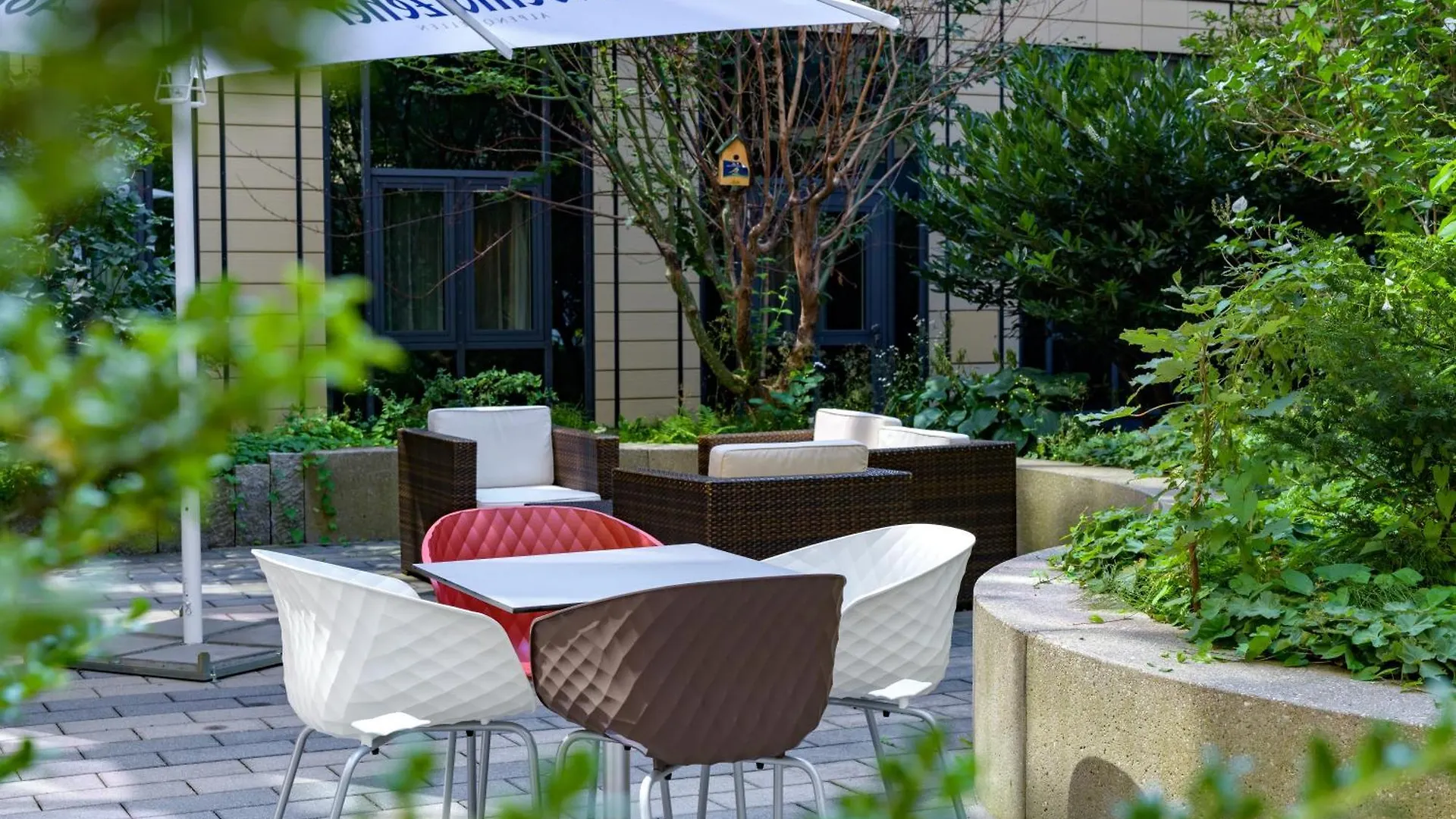 **** Szálloda Novotel Suites Muenchen Parkstadt Schwabing Németország