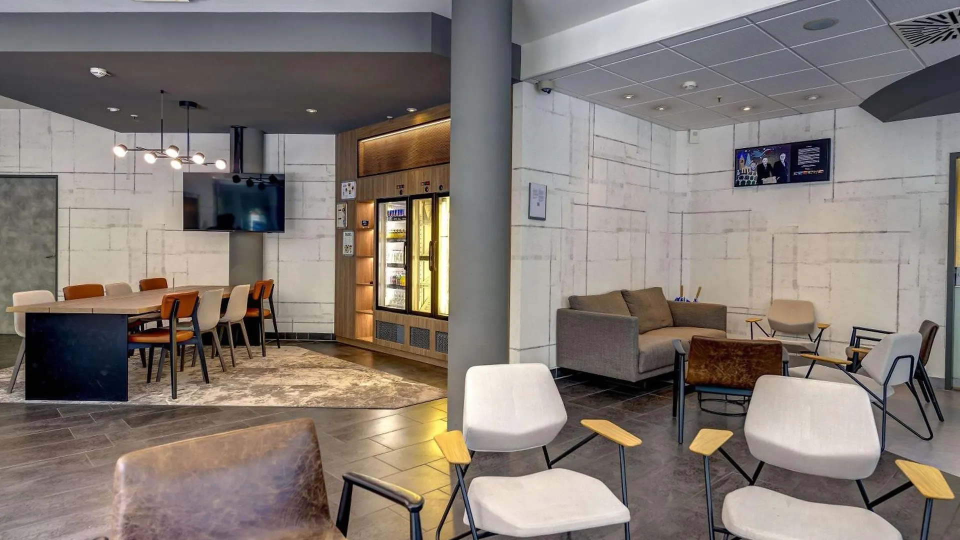 **** Szálloda Novotel Suites Muenchen Parkstadt Schwabing Németország